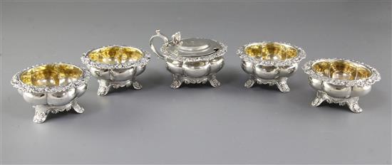 A set of four George III provincial silver table salts with matching mustard, Diameter 3 ¾”/94mm combined weight 21.5oz/609grm
